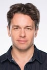 Julian Ovenden isRoman