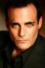 Brian Bloom isClark Kent / Ultraman (voice)