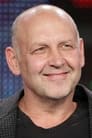 Nick Searcy isStuart