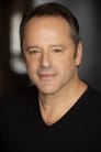 Gil Bellows isOfficer Bill Weaver