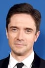 Topher Grace isCarter