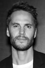 Taylor Kitsch isJustin