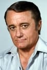 Robert Vaughn isSenator Parker